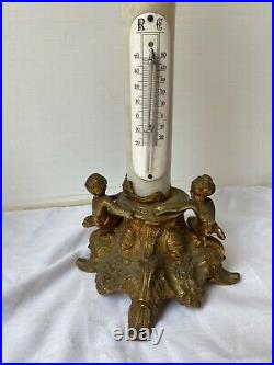 AEarly 1900s antique brass Reaumur Celcius thermometer decorated with angels