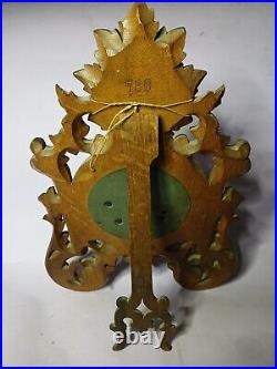 An Antique Blackforest style hand carved German Barometer