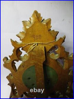 An Antique Blackforest style hand carved German Barometer