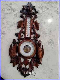 Antique barometer/thermometer black forest wood carved hunting theme, working