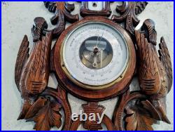 Antique barometer/thermometer black forest wood carved hunting theme, working