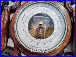 Antique barometer/thermometer black forest wood carved hunting theme, working