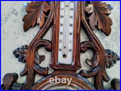 Antique barometer/thermometer black forest wood carved hunting theme, working