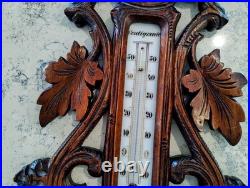 Antique barometer/thermometer black forest wood carved hunting theme, working