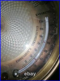 Antique brass barometer