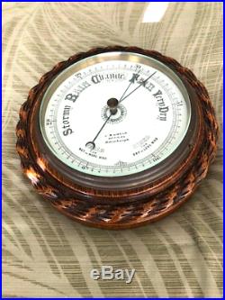 Antique (late 19th century) John Buncle naval rope twist oak-framed barometer