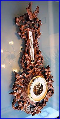 Black Forest walnut wall barometer / thermometer with bird