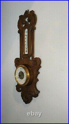 Genuine antique French barometer in wood, metal, brass and glass with beveled