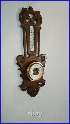 Genuine antique French barometer in wood, metal, brass and glass with beveled