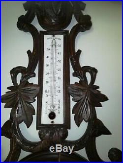 Gorgeous Black Forest Carved Wooden Barometer with Dog Head