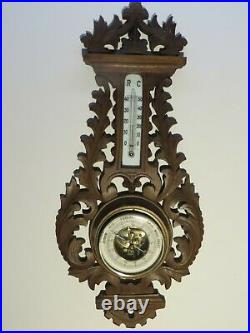 Hand-carved wooden barometer thermometer from the Black Forest around 1880