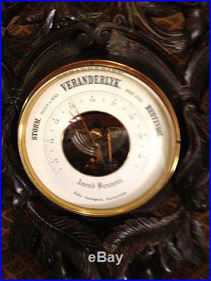 MAGNIFICIENT BLACK FOREST WALNUT CARVED BAROMETER FROM AMSTERDAM ESTATE