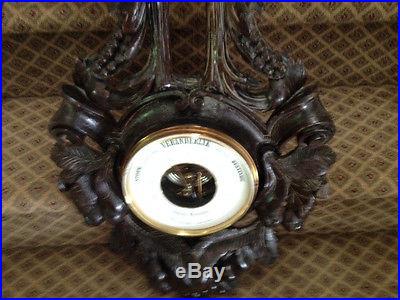 MAGNIFICIENT BLACK FOREST WALNUT CARVED BAROMETER FROM AMSTERDAM ESTATE