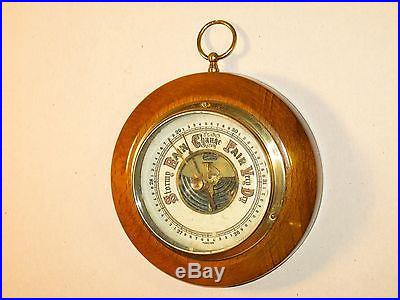 NICE ANTIQUE WOOD AND BRASS BAROMETER