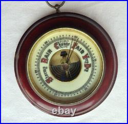 Vintage barometer round wood case metal face fancy wording from Germany