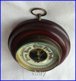 Vintage barometer round wood case metal face fancy wording from Germany