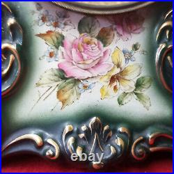 Waterbury Striking Porcelain Clock With Florals Throughout The Case